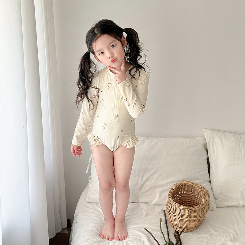 Traje de baño de manga larga para bebé — lunas crema